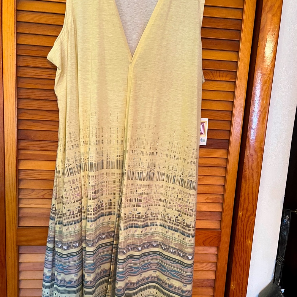 LulaRoe size xl Joy wrap Pale yellow fading to Aztec design.